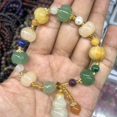 Vòng đeo tay, lắc tay phong thủy kiểu quả bí đá ngọc hoàng long