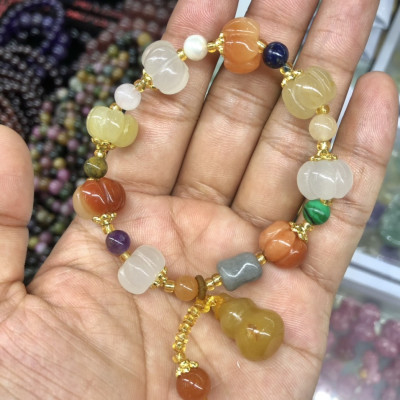 Vòng đeo tay, lắc tay phong thủy kiểu quả bí đá ngọc hoàng long