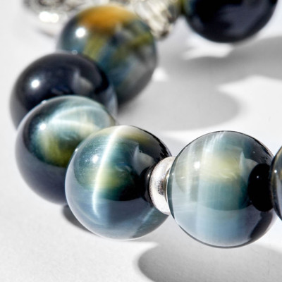 Vòng tay mặt trời đen charm lục tự Ngọc Quý Gemstones